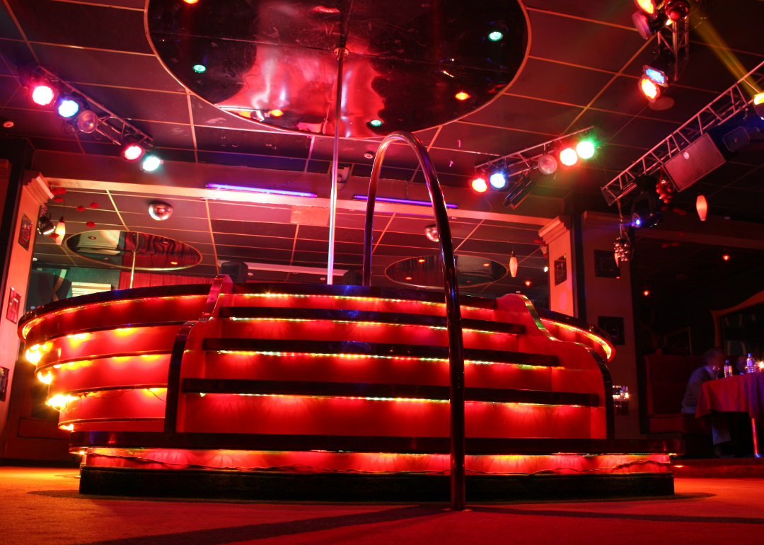 Night club podium with red lights.