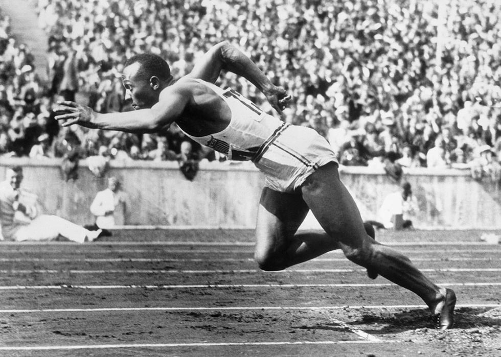 Jesse Owens at the start of a race.