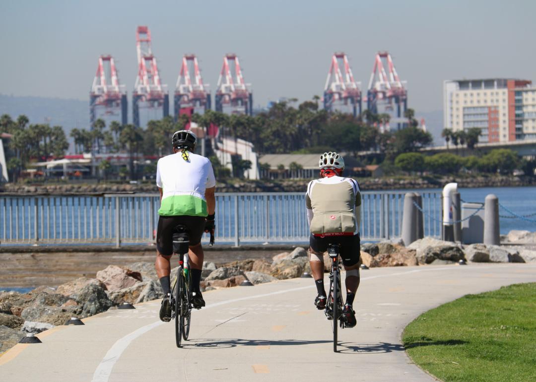 Cyclists along coastline of Long Beach
