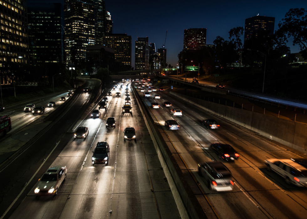 Traffic on urban highway at night