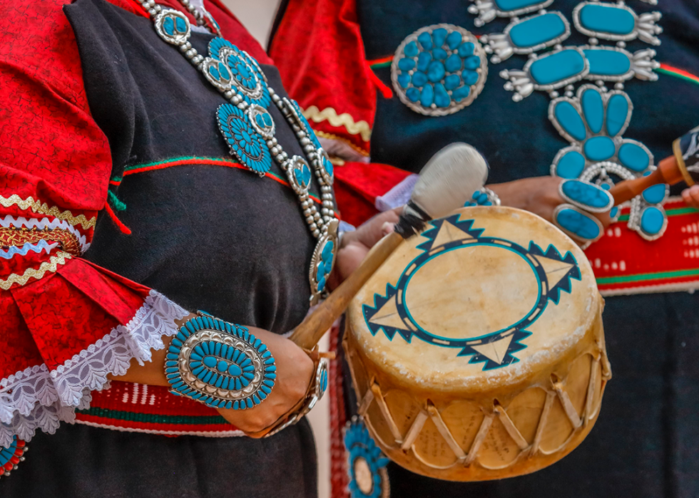A Zuni Native American plays a drum in a ceremony in Gallup, New Mexico.