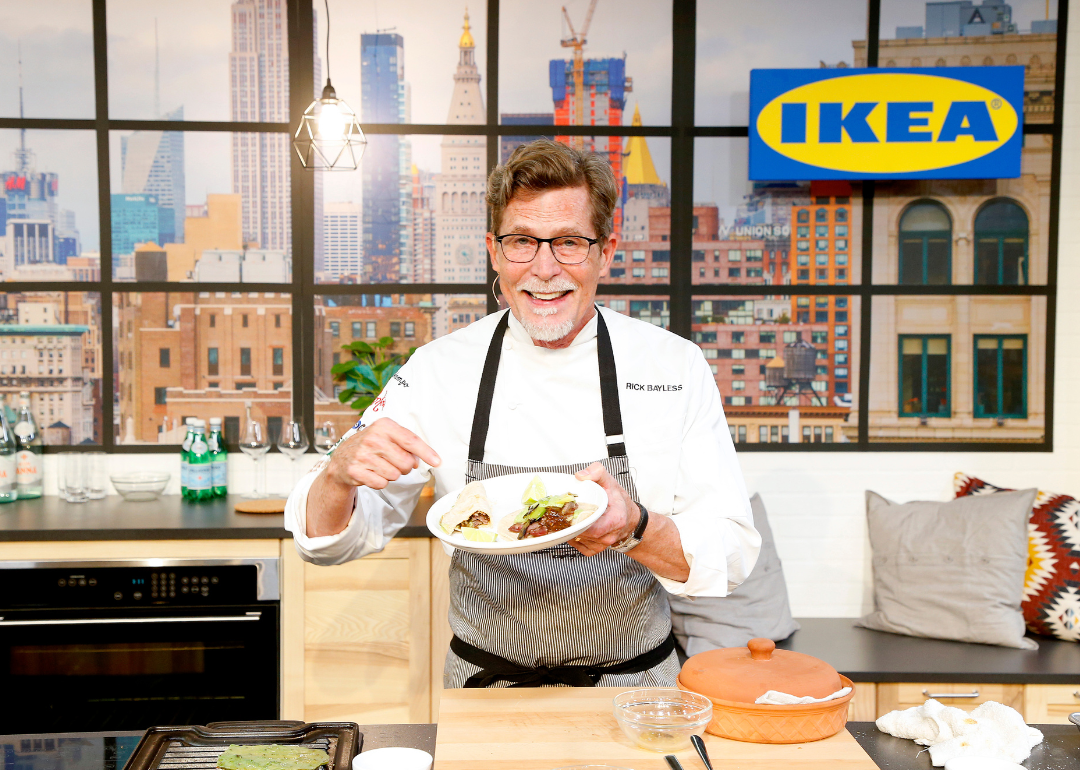 Rick Bayless onstage during a cooking demo.