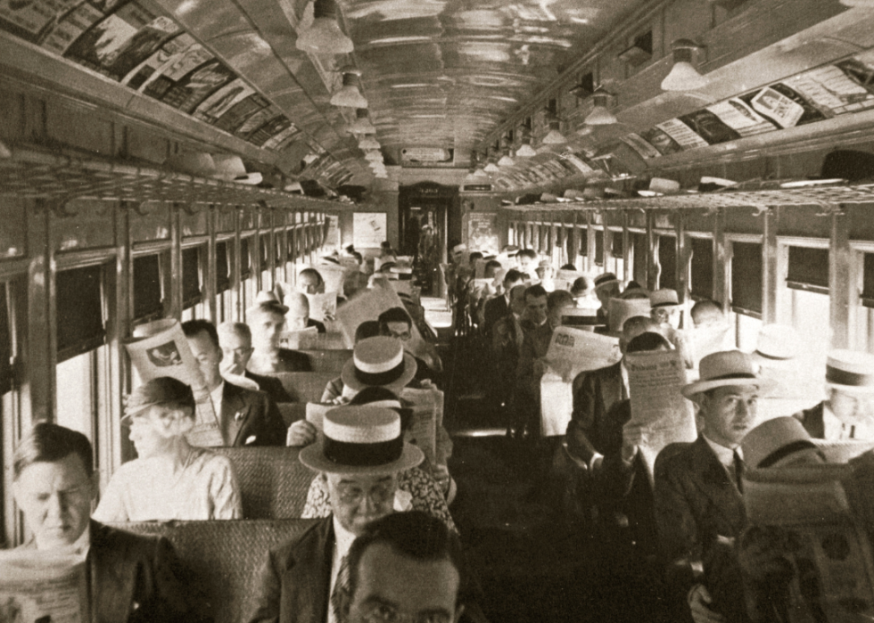 Rail commuters on train.