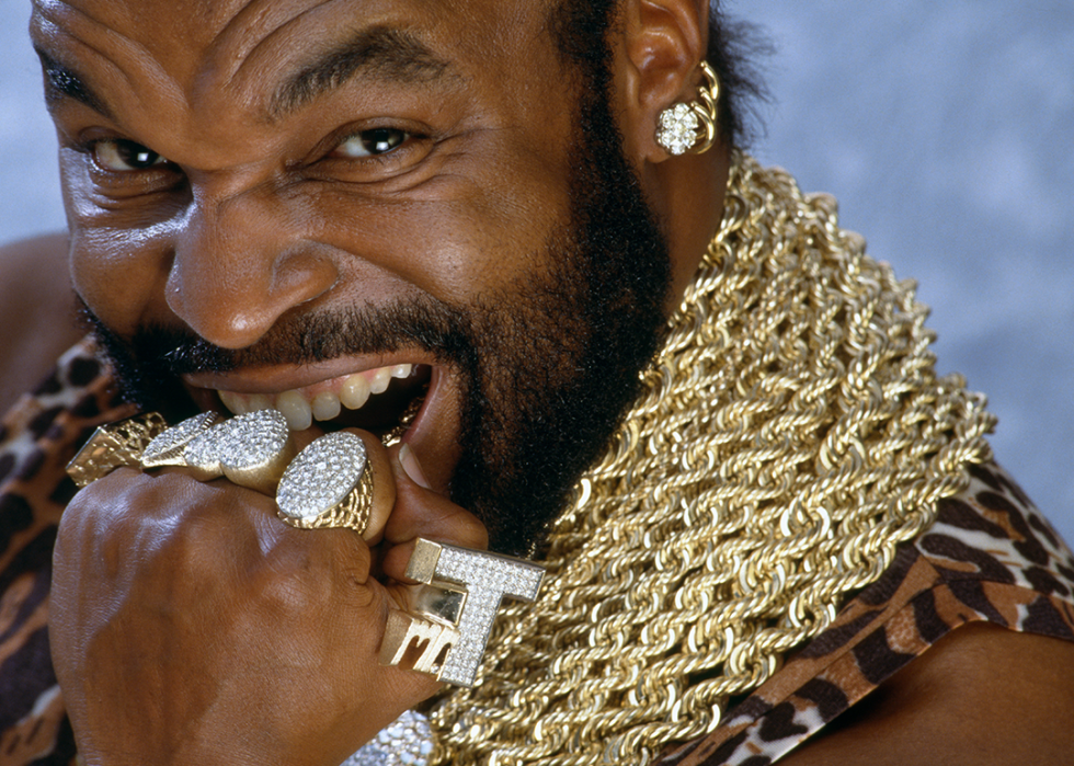 Mr. T poses with rings.