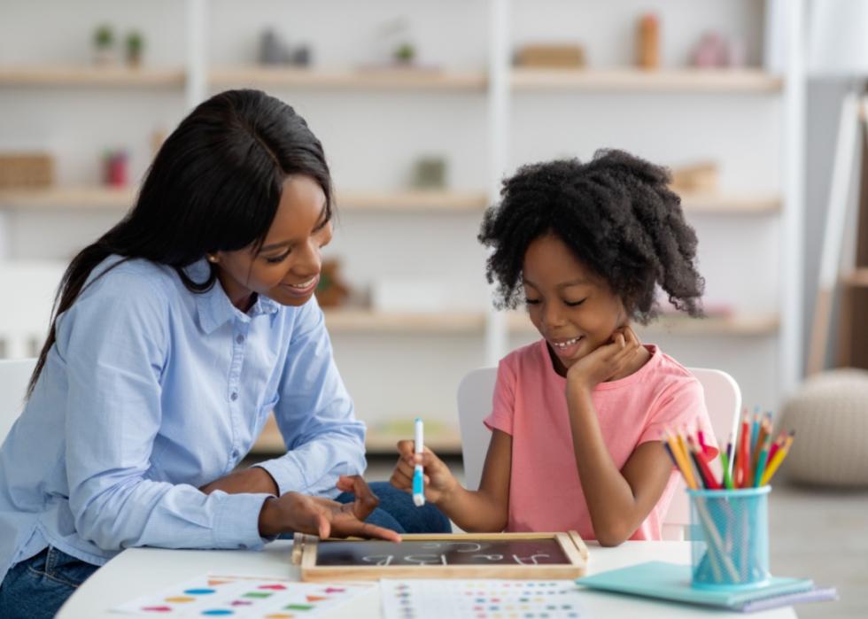 A counselor helping a child.