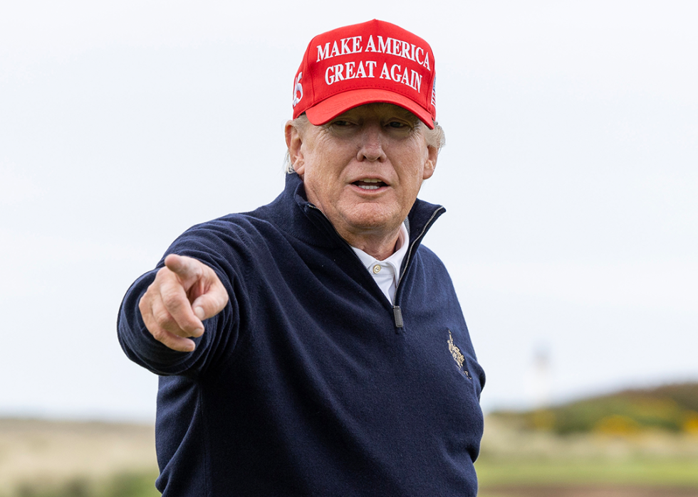 President Donald Trump gestures during a round of golf at his Turnberry course.