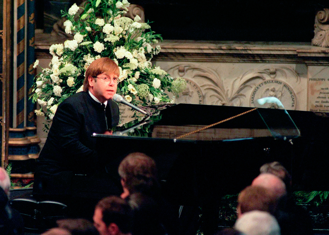 Elton John sings 'Candle in the Wind' at the funeral of Diana, Princess of Wales.