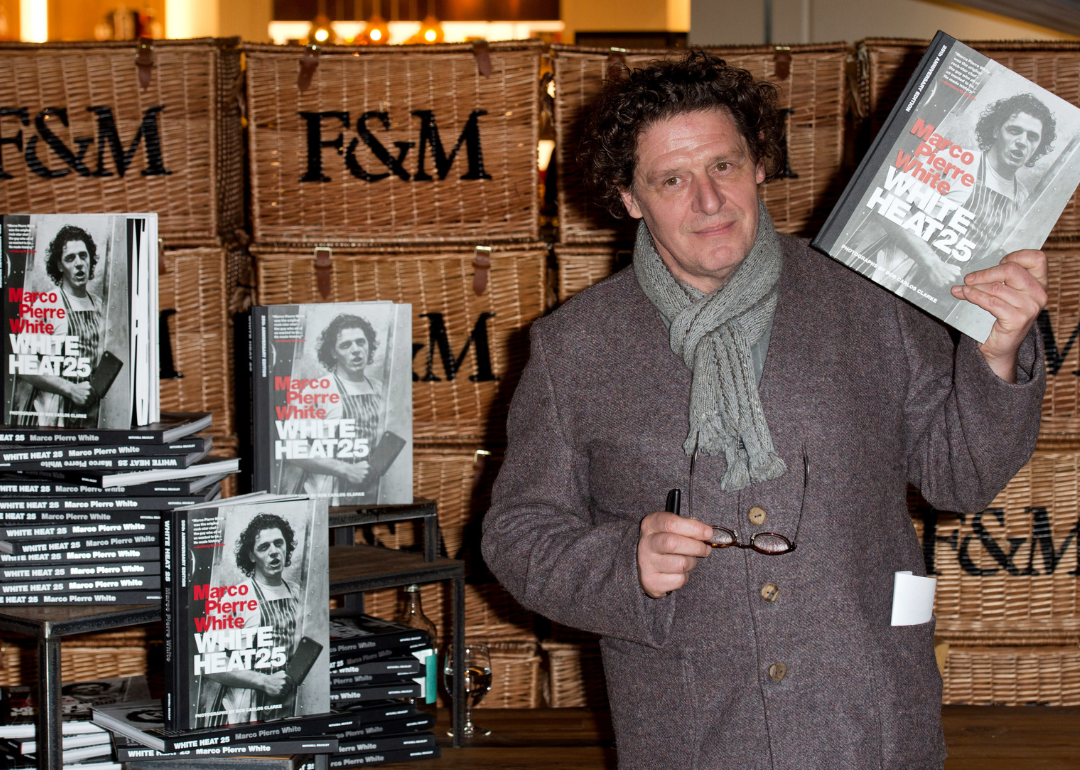 Marco Pierre White signs copies of his "White Heat 25."