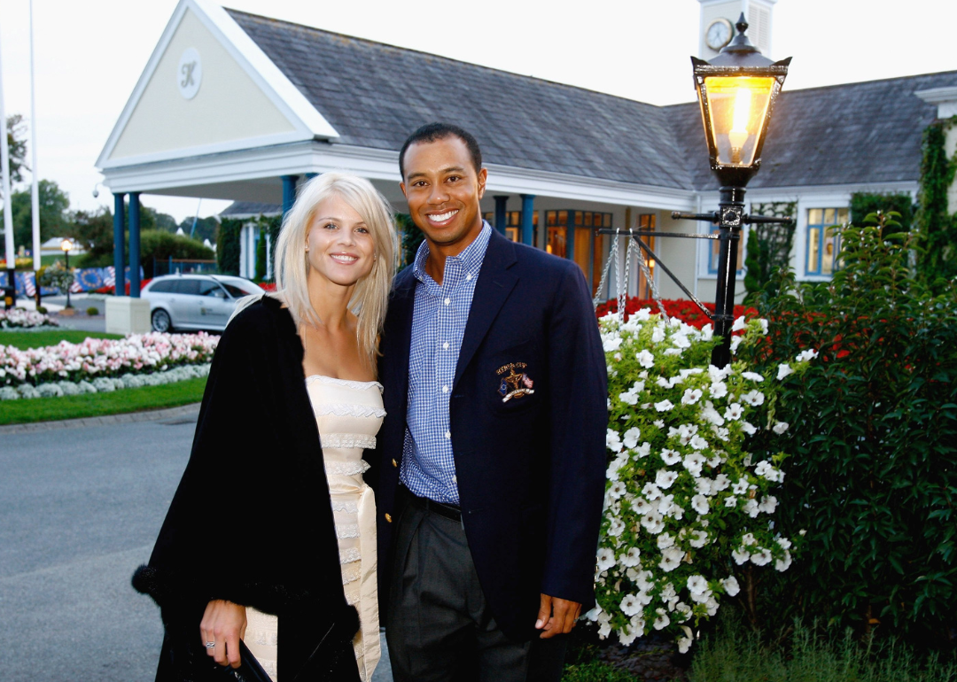 Tiger Woods and Elin Nordegren pose at event
