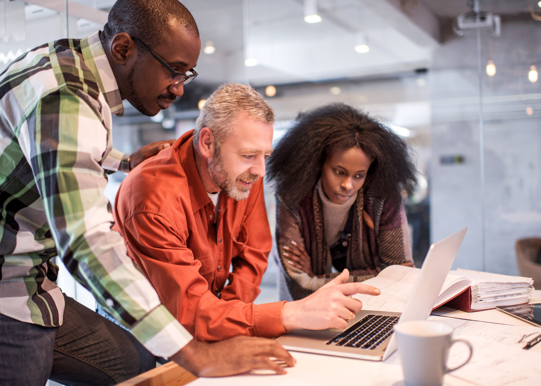 Small business team using computer.