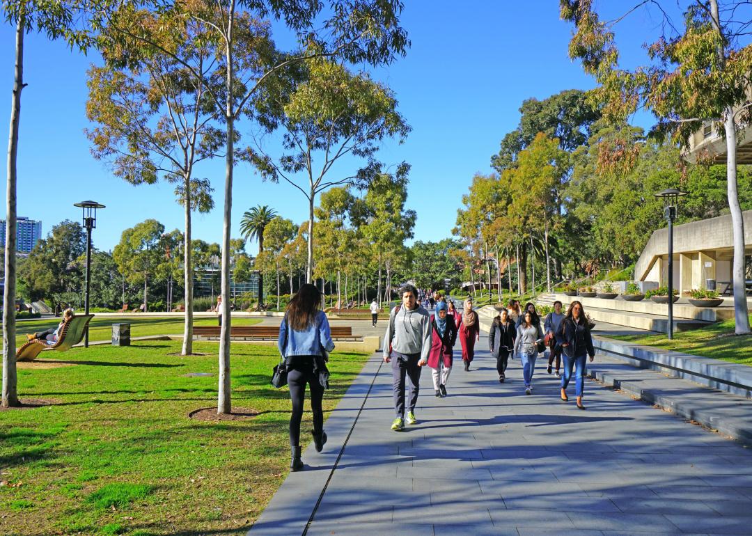 Students walking on University of Sydney campus.