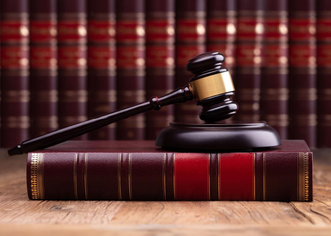 Judge’s gavel on legal books