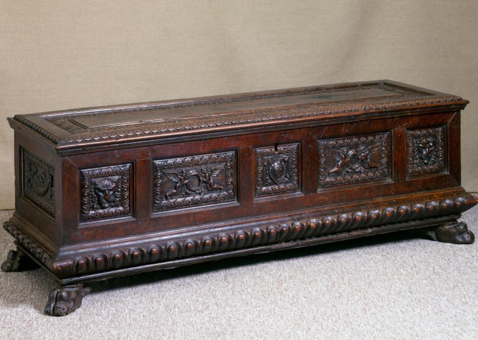 Florentine wedding chest with ornate carvings.