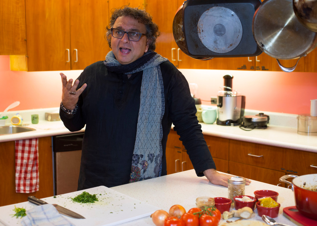 Vikram Vij speaks in a kitchen.