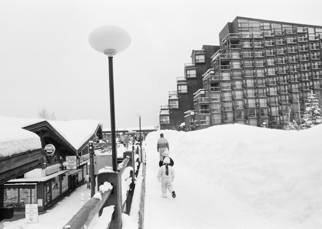 ‘Les Arcs’ building and train station in winter.