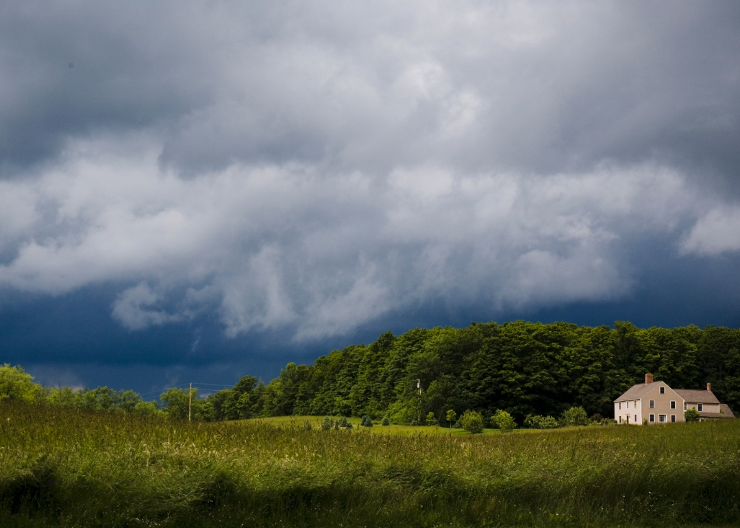 Rural Vermont landscape with storm clouds.