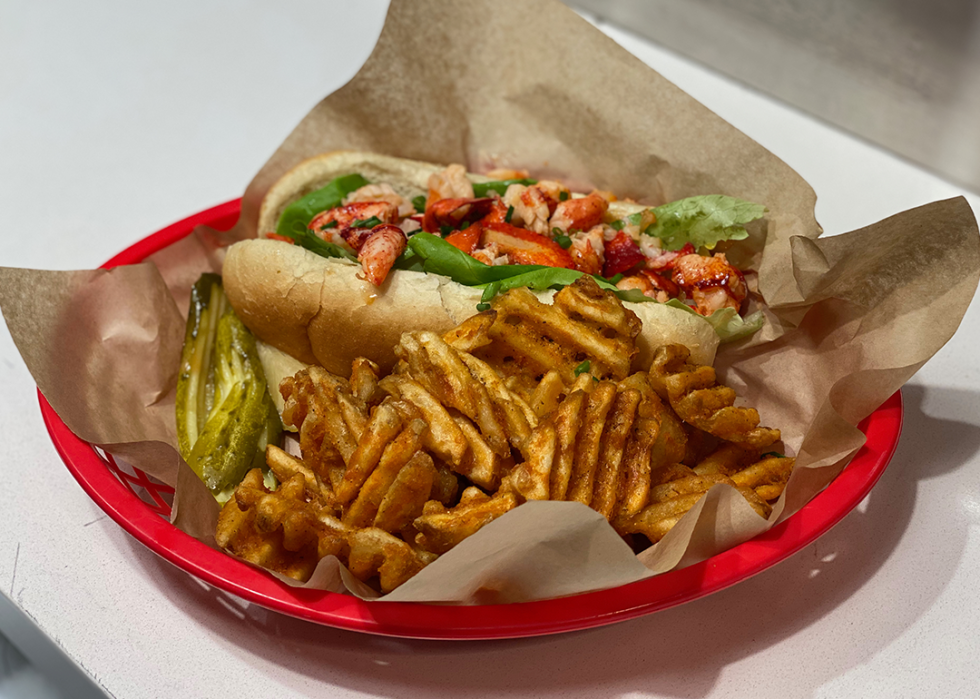 Connecticut style lobster roll with fries.