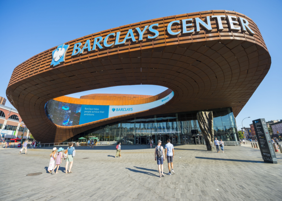 Pedestrians under the entrance to the Barclays Center