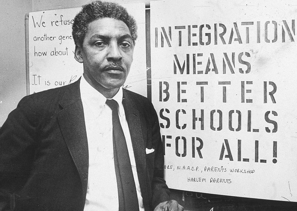 Bayard Rustin poses at The Citywide Committee for Integration Headquarters.