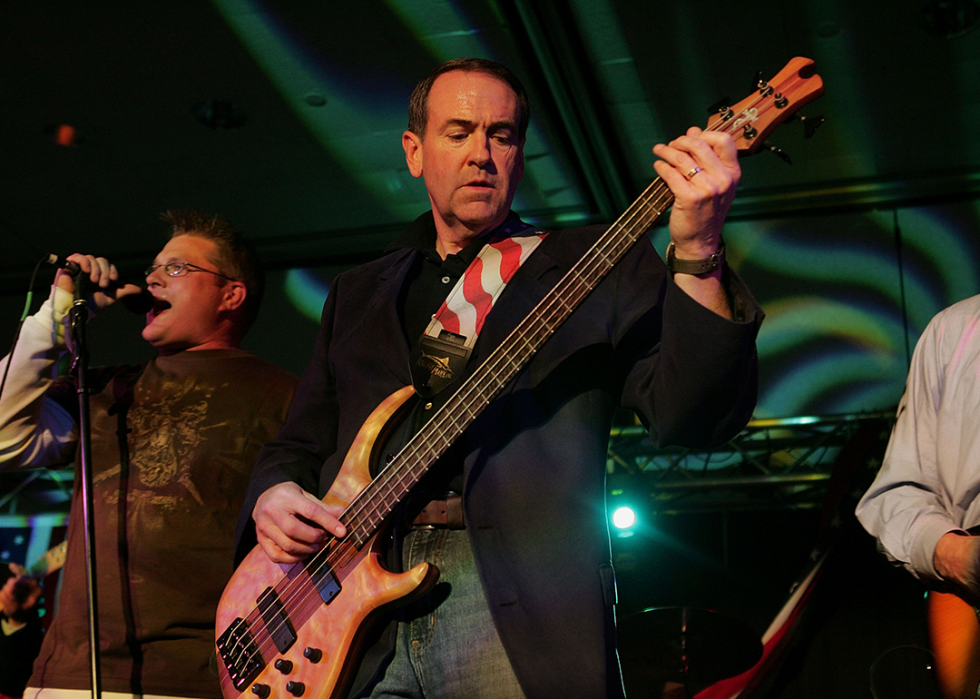 Mike Huckabee plays bass with his band Capitol Offense.