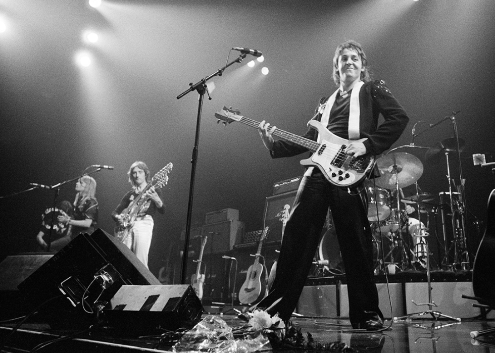 Paul McCartney and Wings performing on stage.