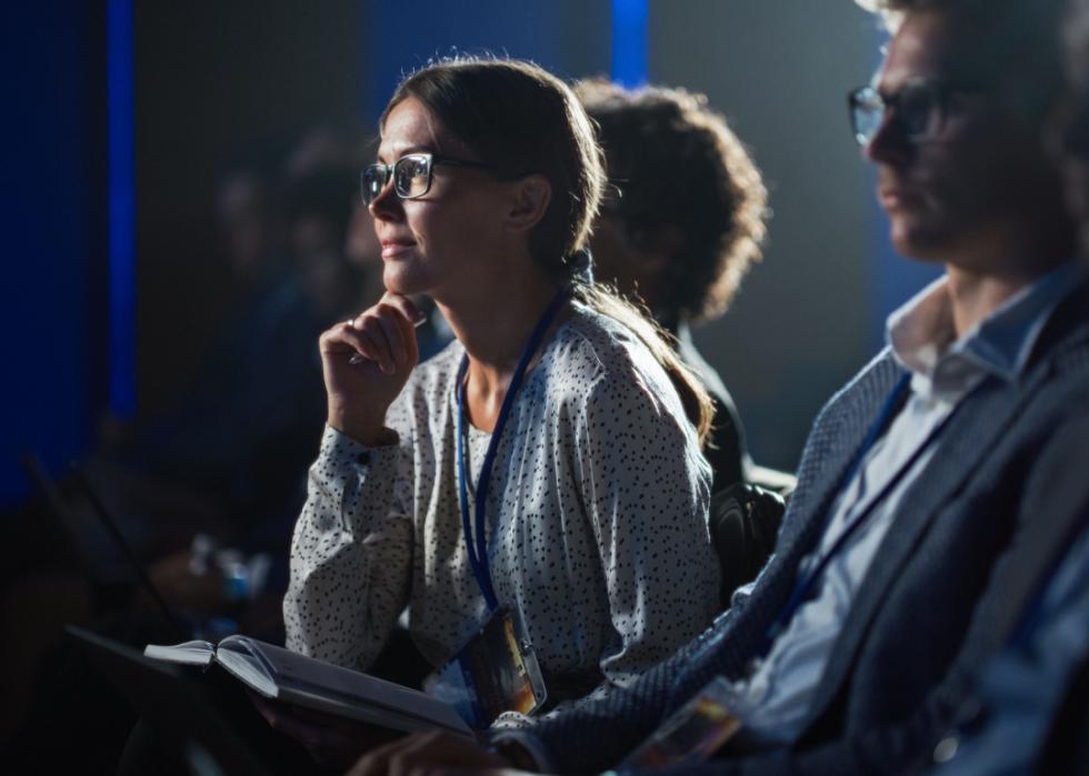 Woman attending conference.