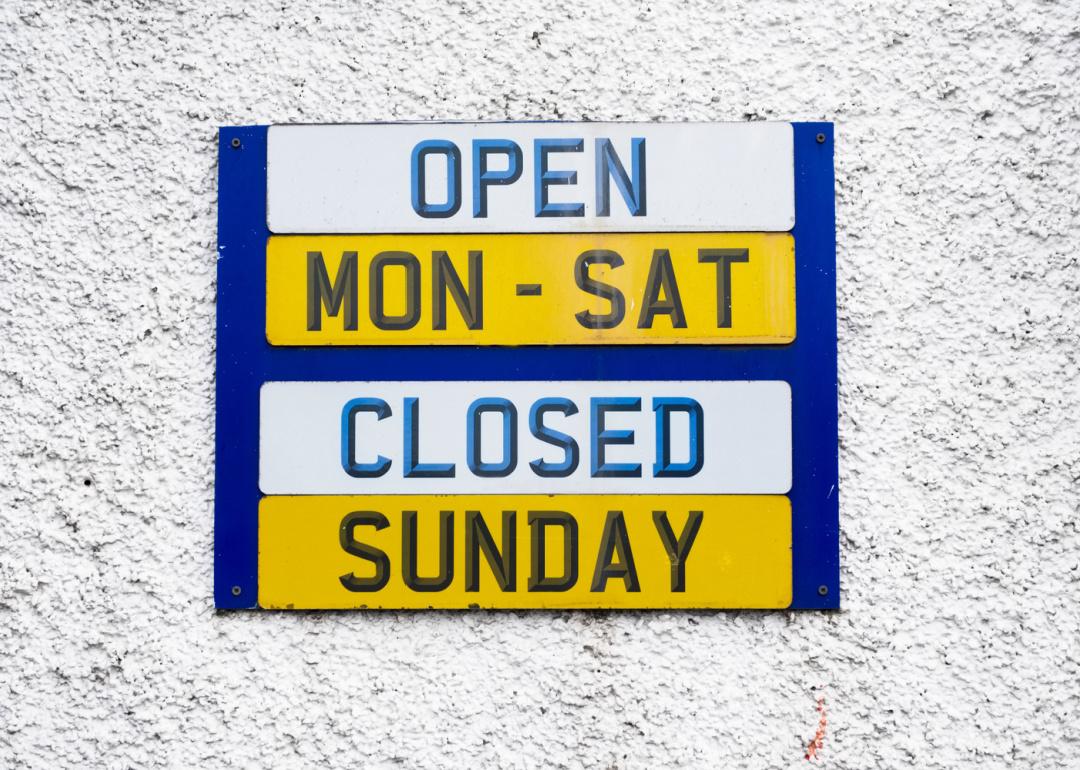 “Open Mon-Sat Closed Sunday” sign.