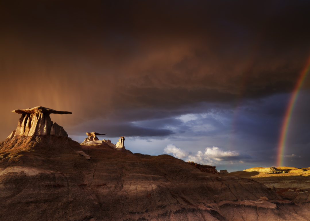 Dramatic storm sky over Bisti Badlands.