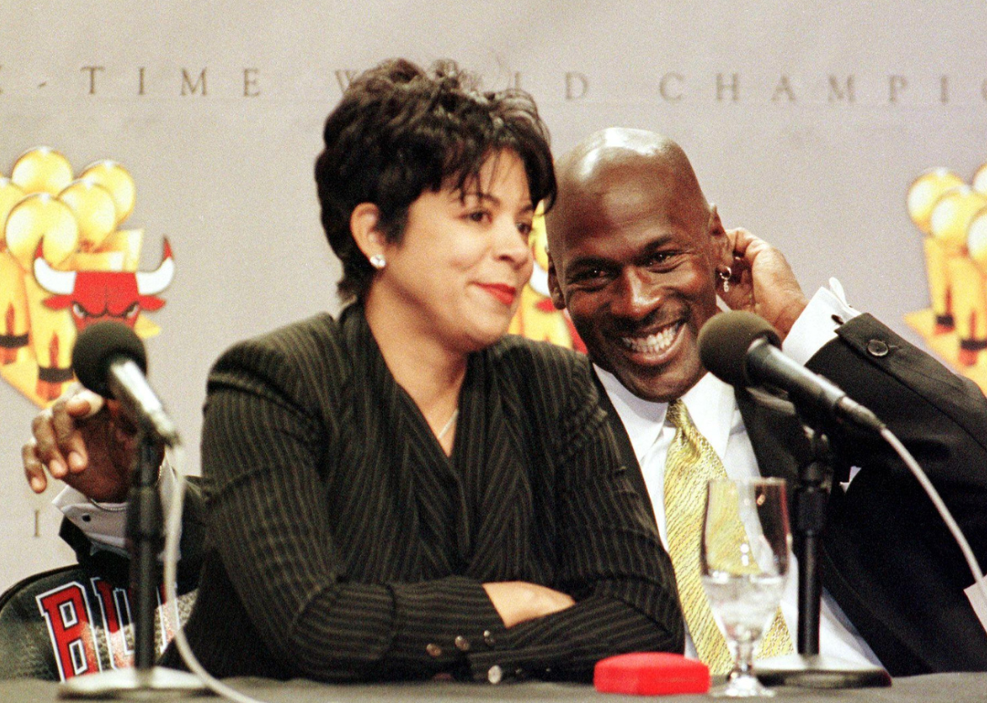 Michael Jordan and Juanita Vanoy sit together a press conference