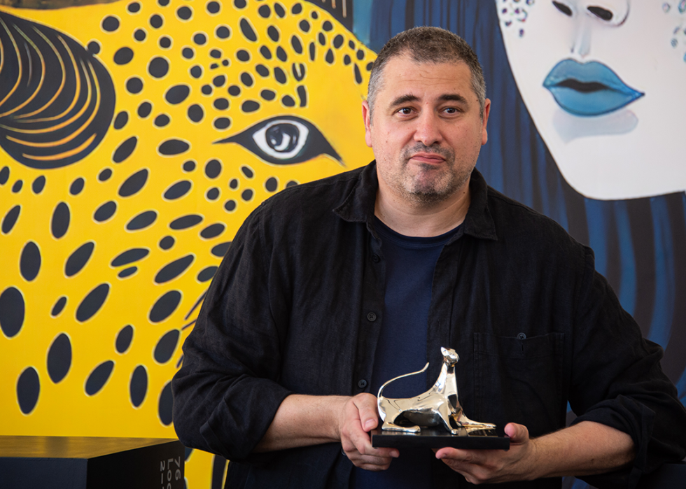 Radu Jude poses for press portrait at the Locarno Film Festival.