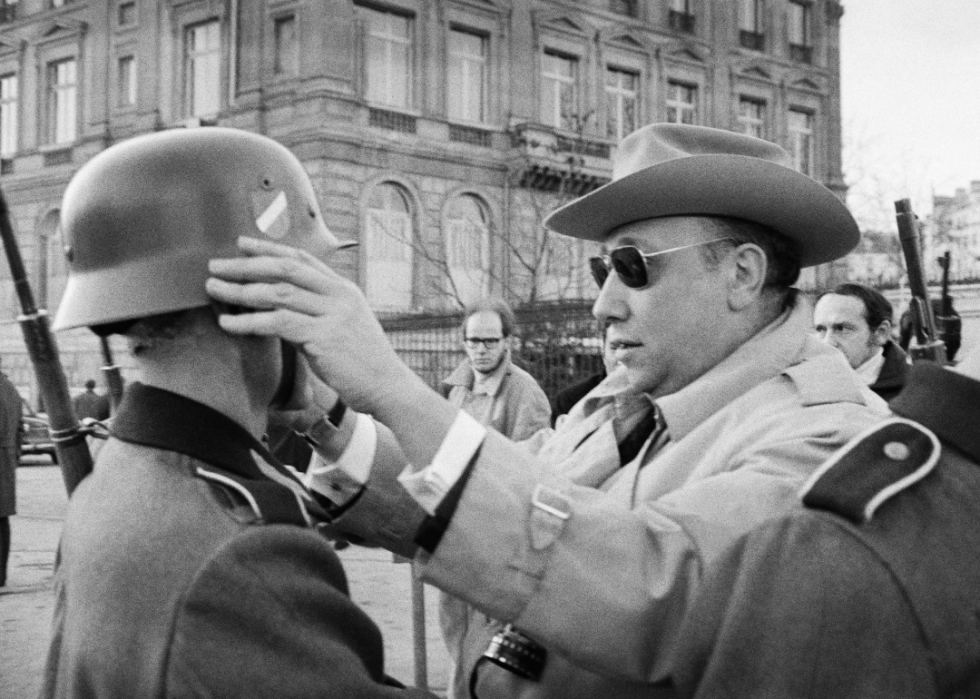 Jean-Pierre Melville on the set of ‘Army of Shadows’.