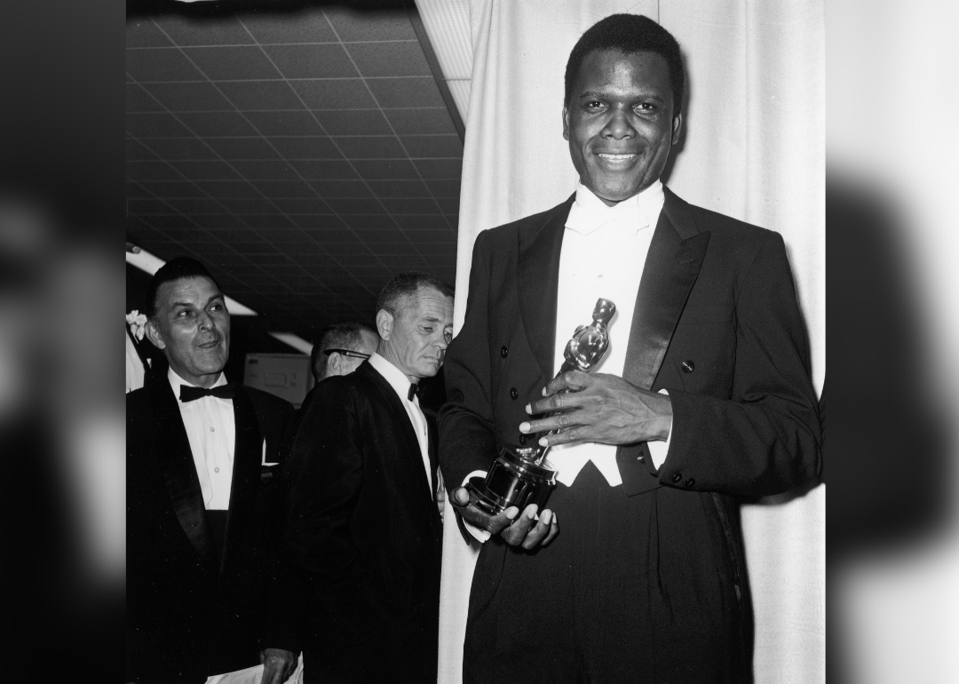 Sidney Poitier holds his Best Actor Oscar for ‘Lilies of the Field’.