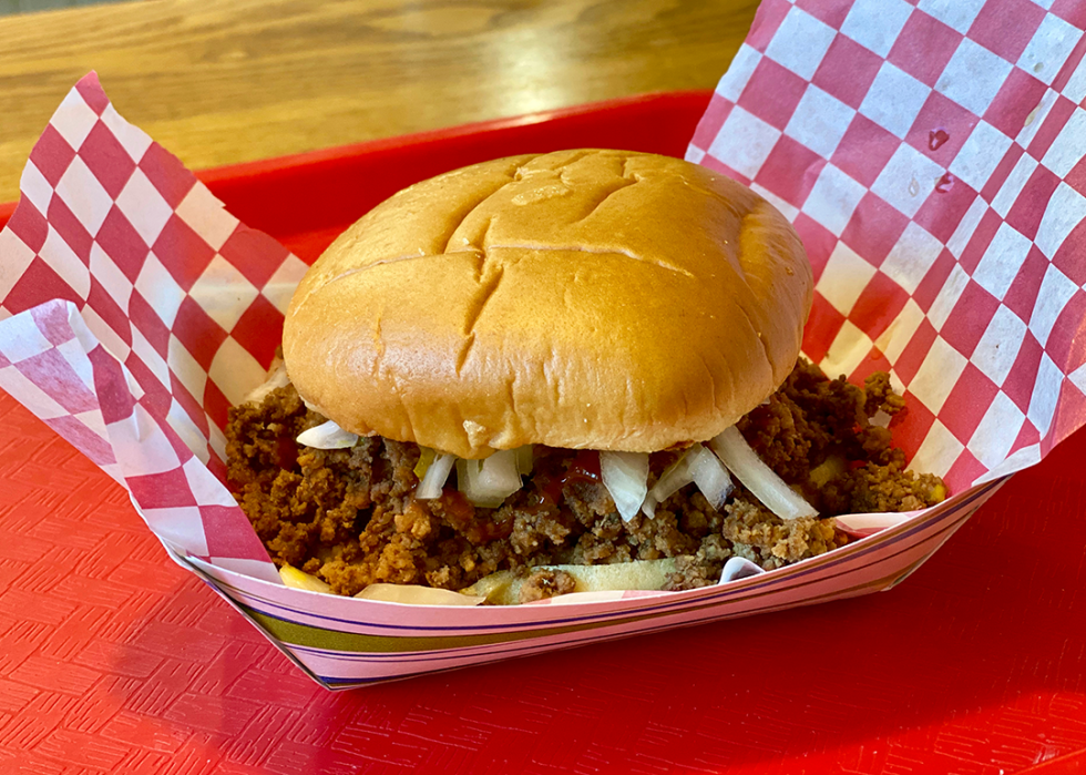 Seasoned ground beef loose meat sandwich served on a warm bun.