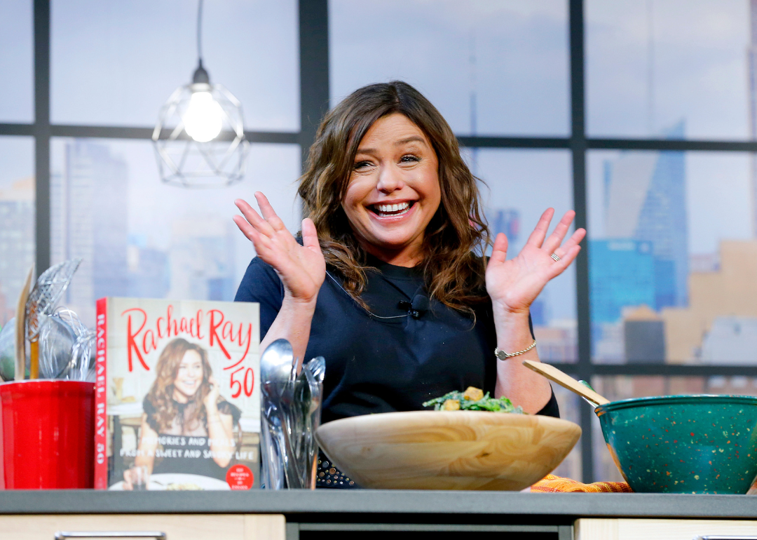 Rachael Ray on stage during a culinary demonstration.