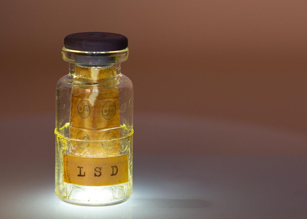 Old glass bottle labeled “LSD”.