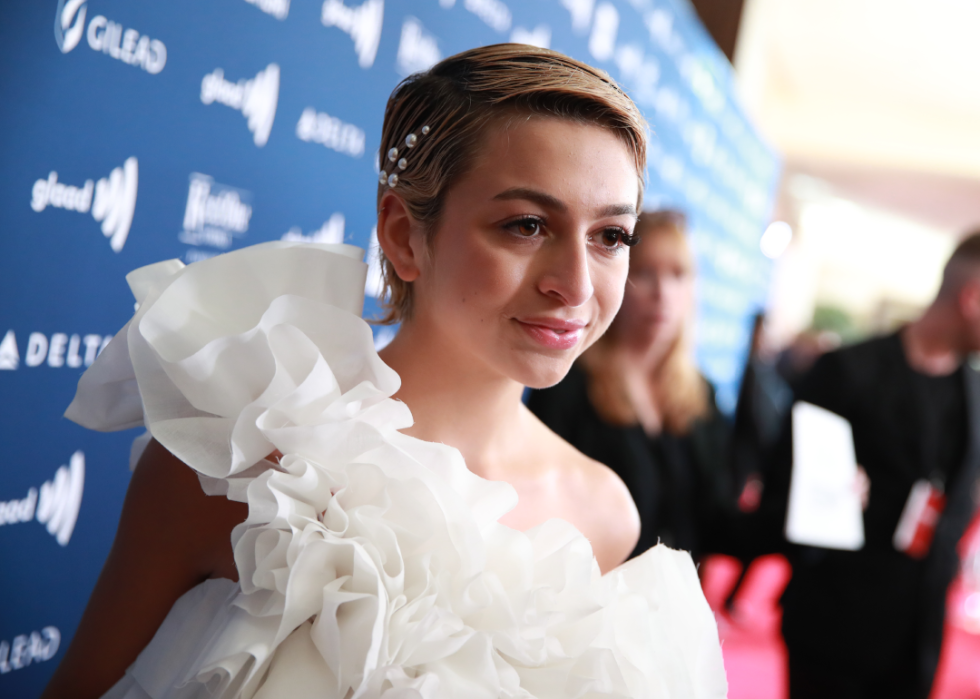 Josie Totah poses for photographers at event.
