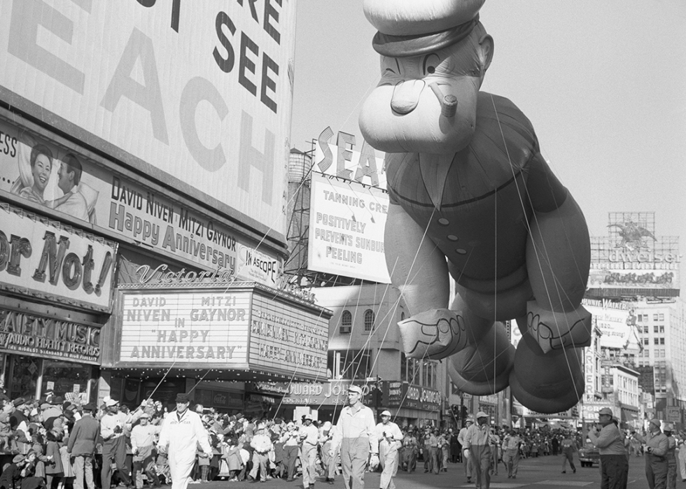 The Popeye balloon makes its way through Times Square.