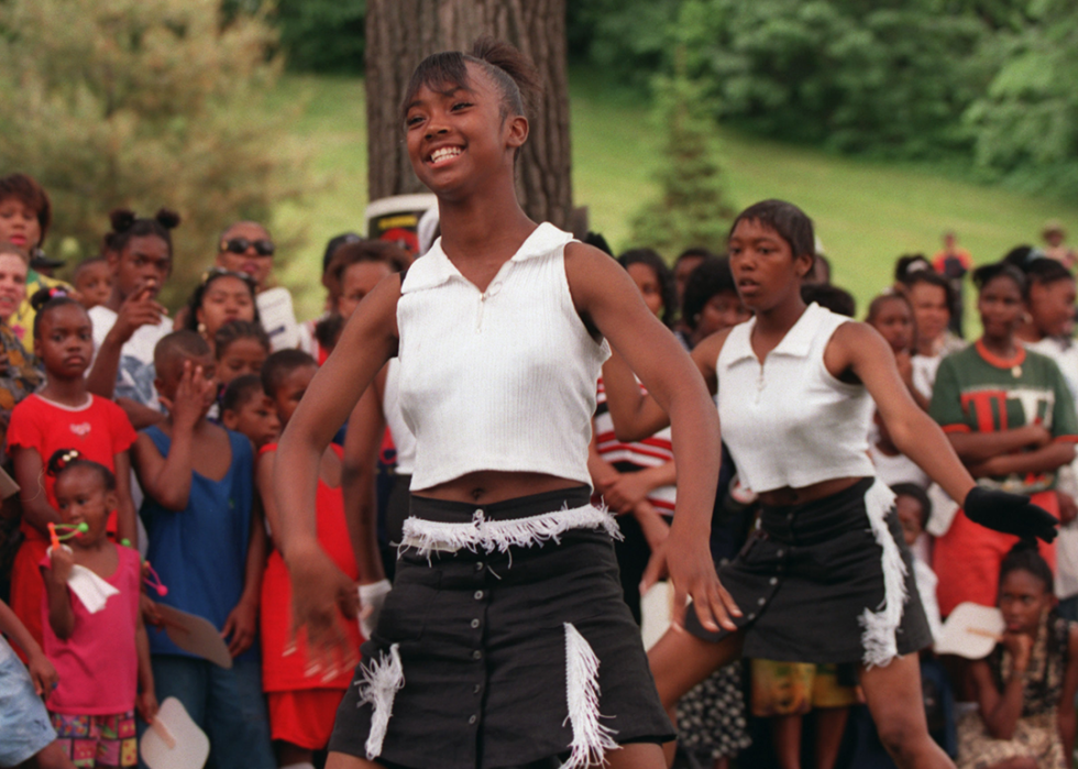 Members of a dance troupe perform in Theodore Wirth Park in Minneapolis.
