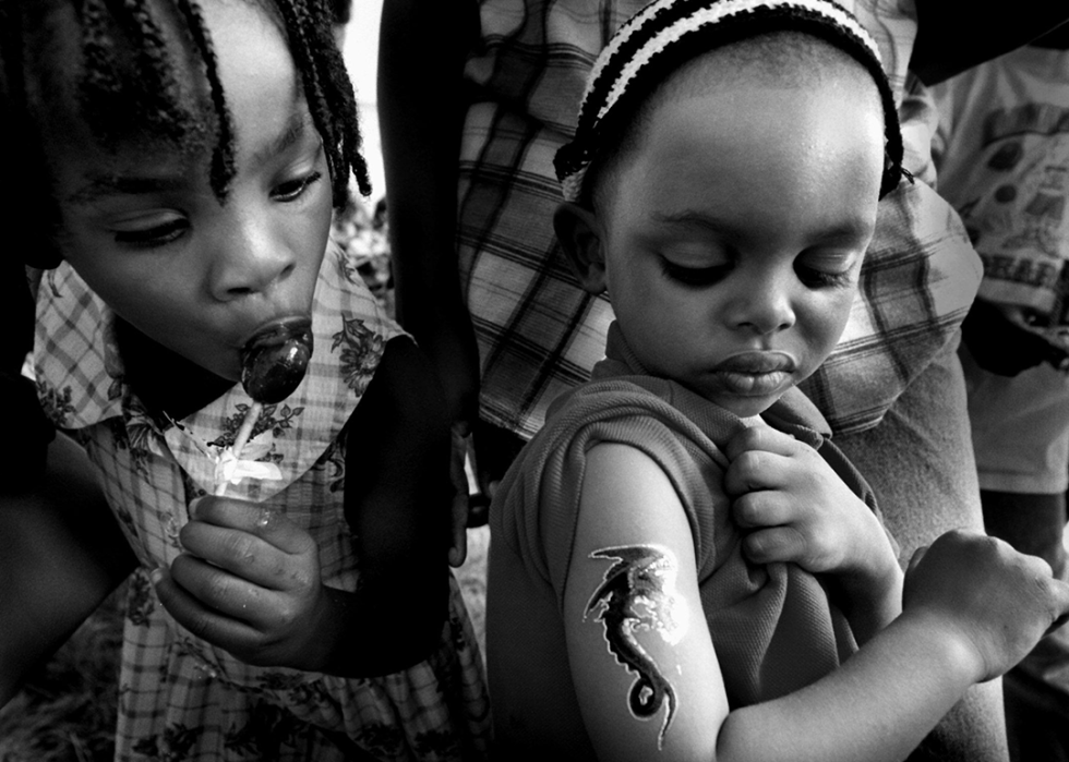Two children enjoy Juneteenth celebrations.