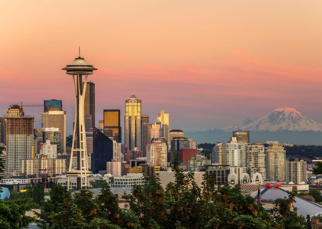 Seattle skyline and Mt Rainier at sunset.