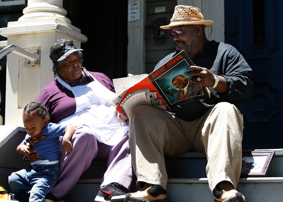 Community members share stories at a park in Oakland.