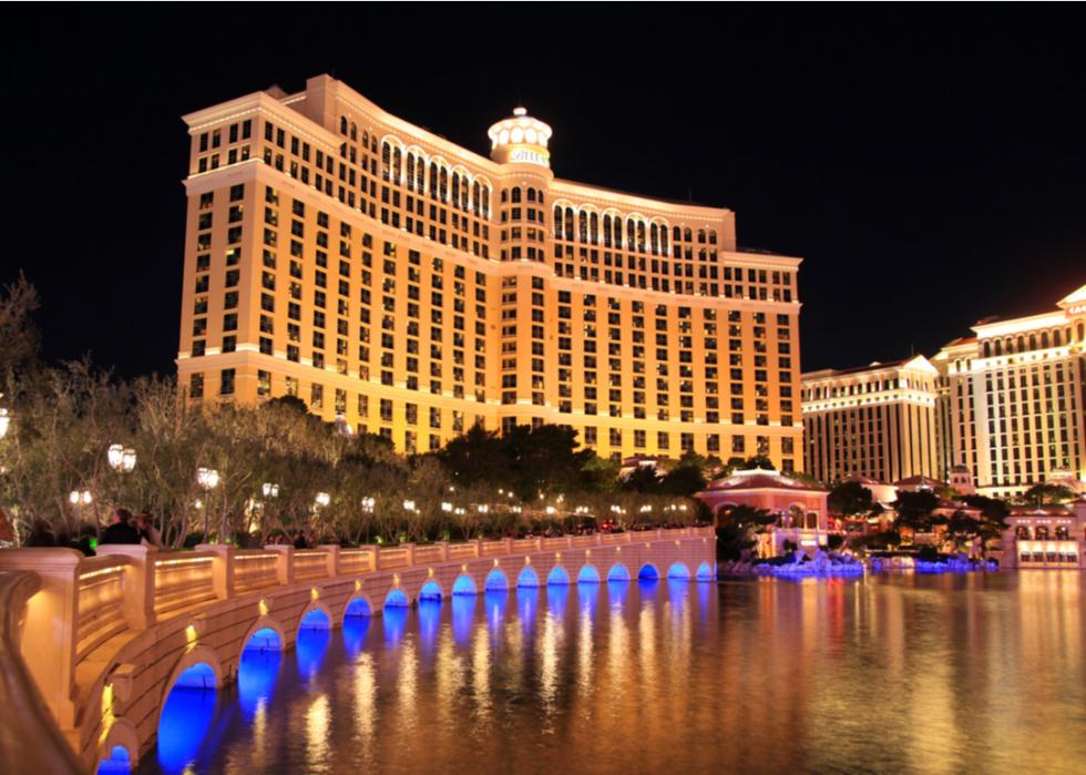 An exterior view of the Bellagio casino at night.