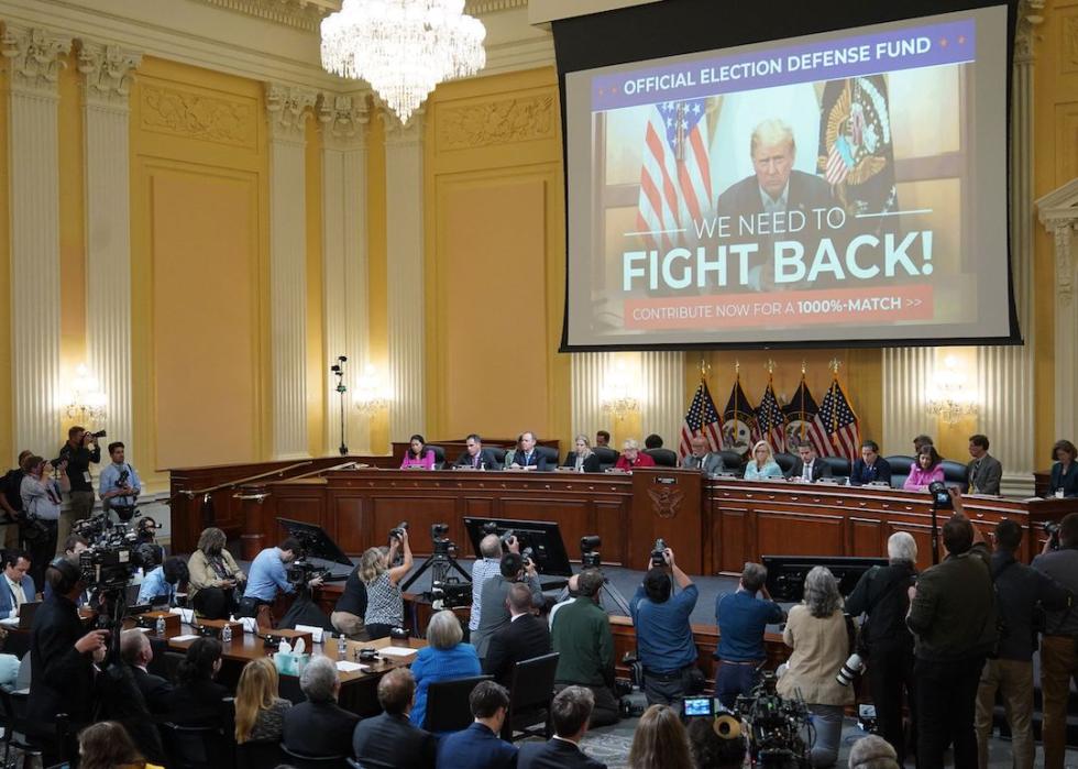 A video of former US president Donald Trump is seen on a screen during a House Select Committee hearing to Investigate the January 6th Attack on the US Capitol, in the Cannon House Office Building on Capitol Hill in Washington, DC on June 13, 2022.