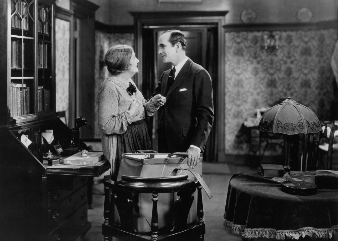 Eugenie Besserer and Al Jolson speaking in the parlor in a scene from the film 'The Jazz Singer.'