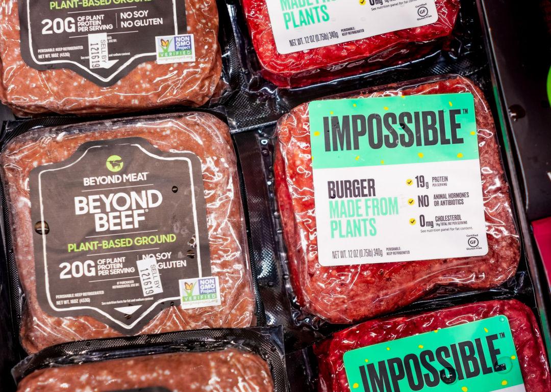 Packaged Beyond Burgers and Impossible Burgers for sale at a supermarket.