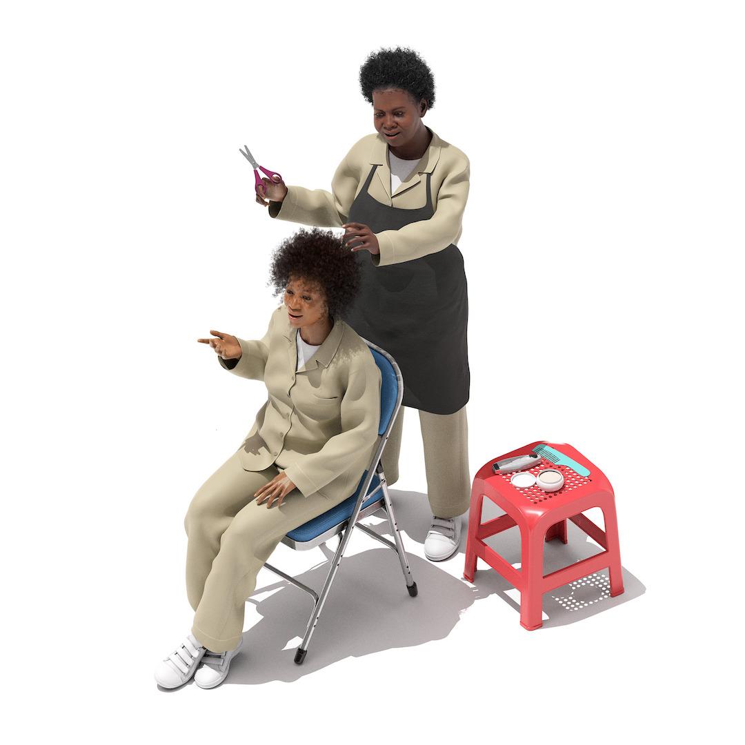 A person stands and holds scissors behind a person sitting in a chair.