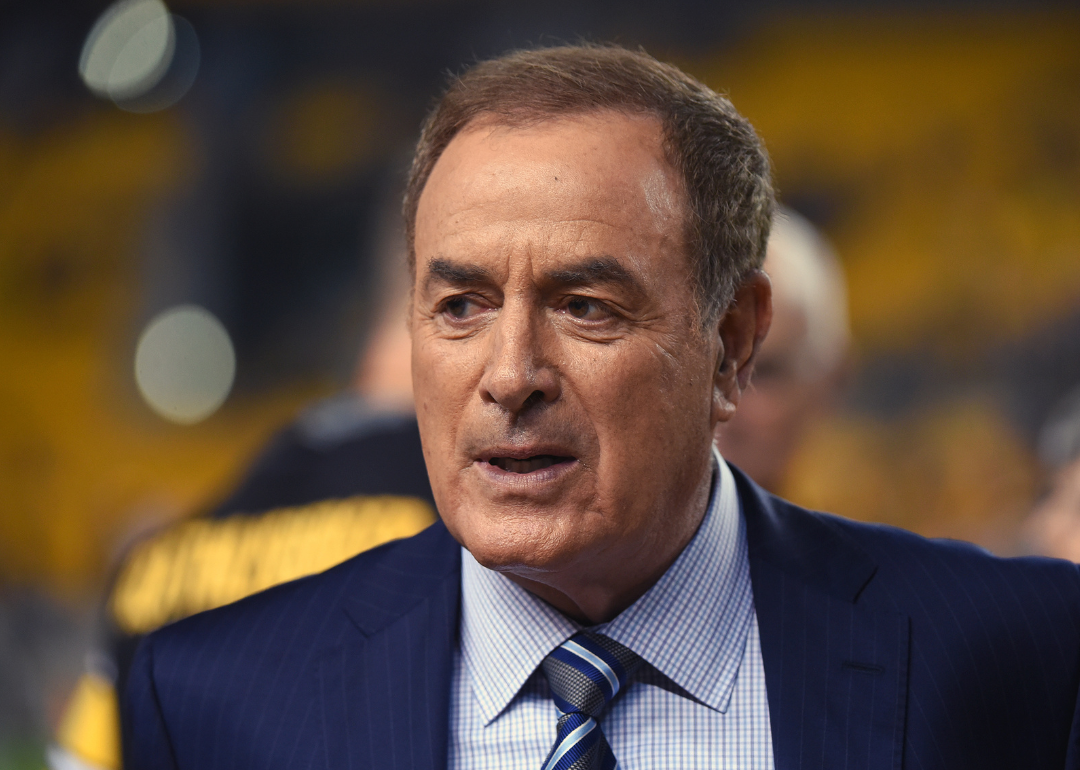 Al Michaels looks on from the sideline before a game.