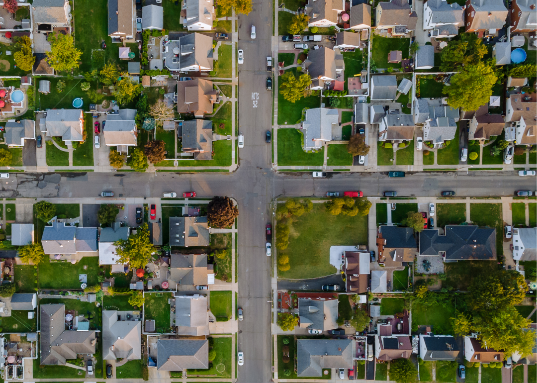 An aerial view of a residential neighborhood with single family homes.