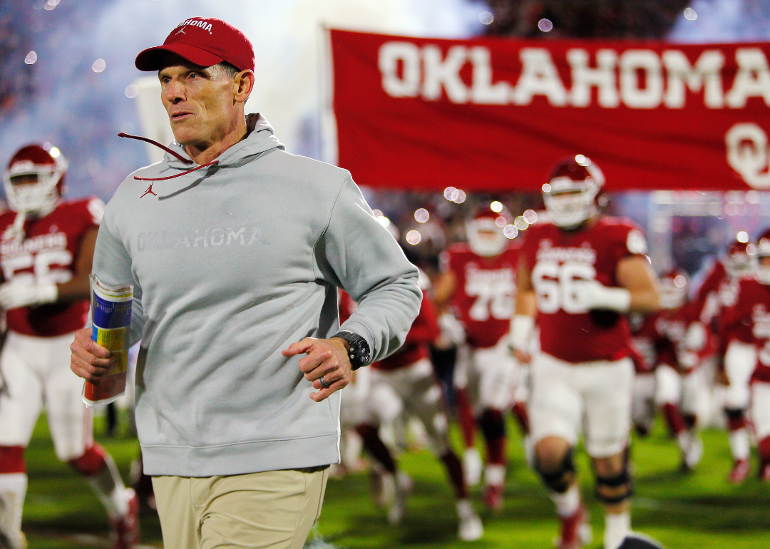 Head coach Brent Venables of the Oklahoma Sooners takes the field with his team for Bedlam against the Oklahoma State Cowboys during Bedlam at Gaylord Family Oklahoma Memorial Stadium on November 19, 2022 in Norman, Oklahoma.