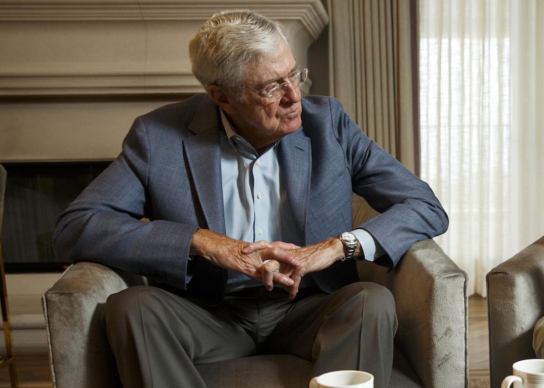 Charles Koch sits with his hands folded during an interview with the Washington Post.